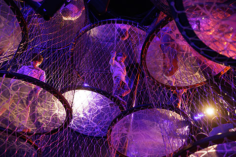 Students in a dark jungle gym. Links to What to Give