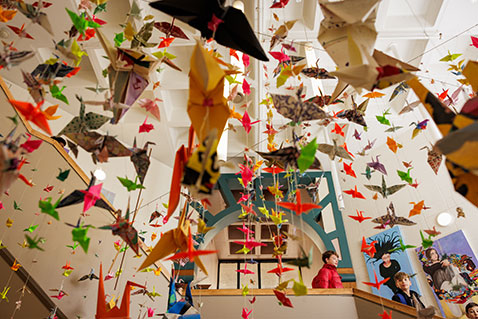 Paper origami hanging from the ceiling. Links to Gifts That Protect Your Assets